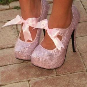 Pink rhinestone pumps with bow